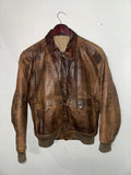 Distressed brown leather bomber jacket front view