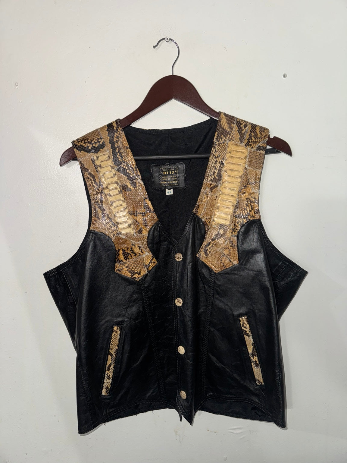 Front of genuine snakeskin and black leather vest, size Large 44