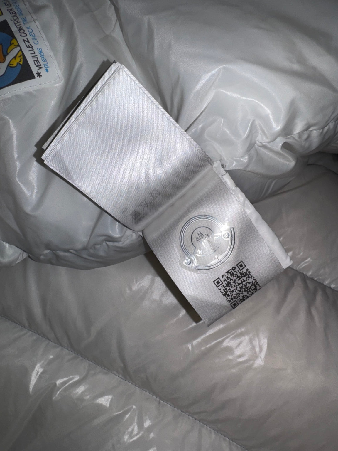 Moncler Gaou jacket authenticity tag detail