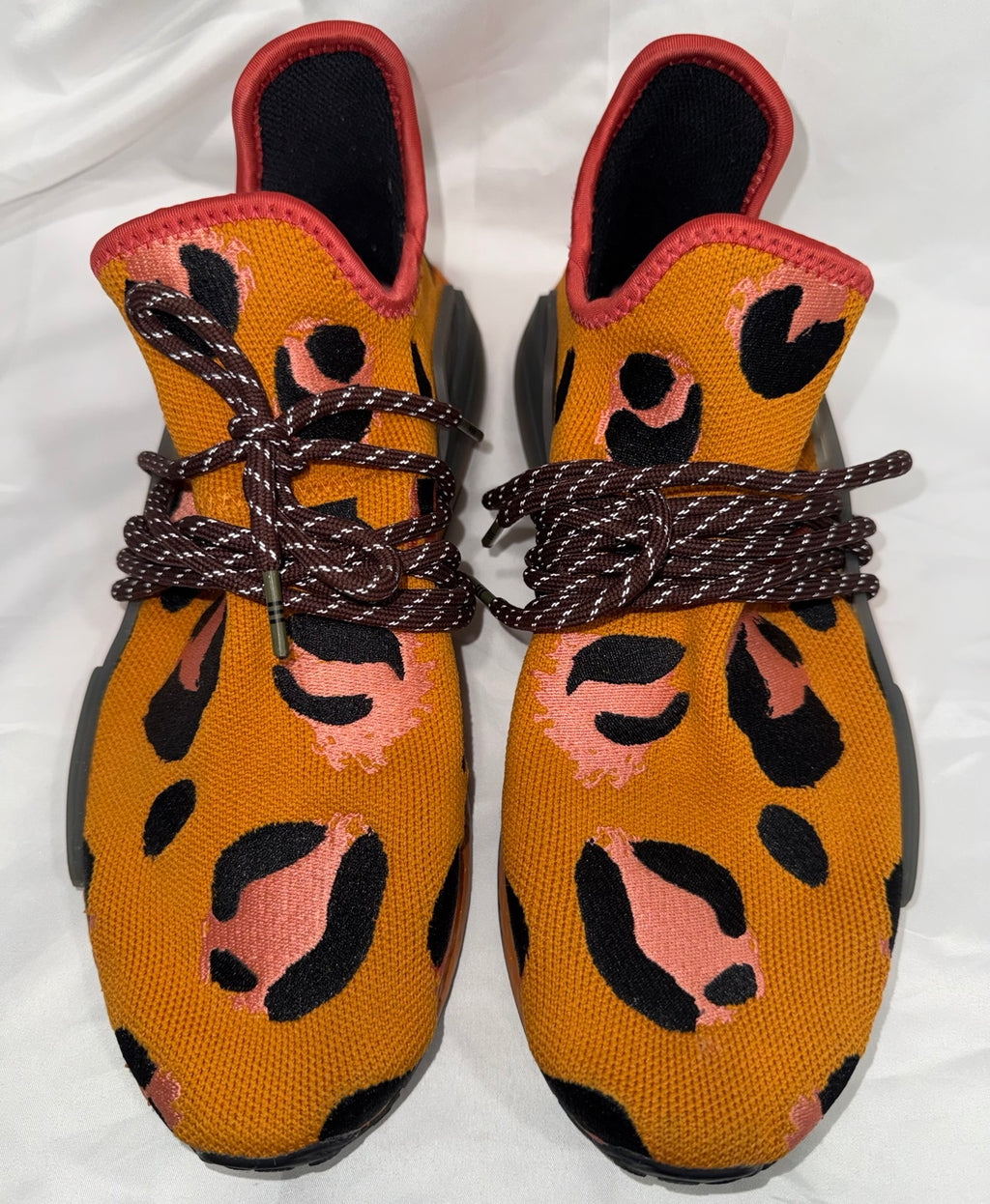 Pharrell adidas NMD Hu Animal Print Pulse Amber front view