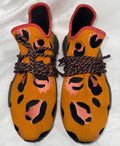 Pharrell adidas NMD Hu Animal Print Pulse Amber front view