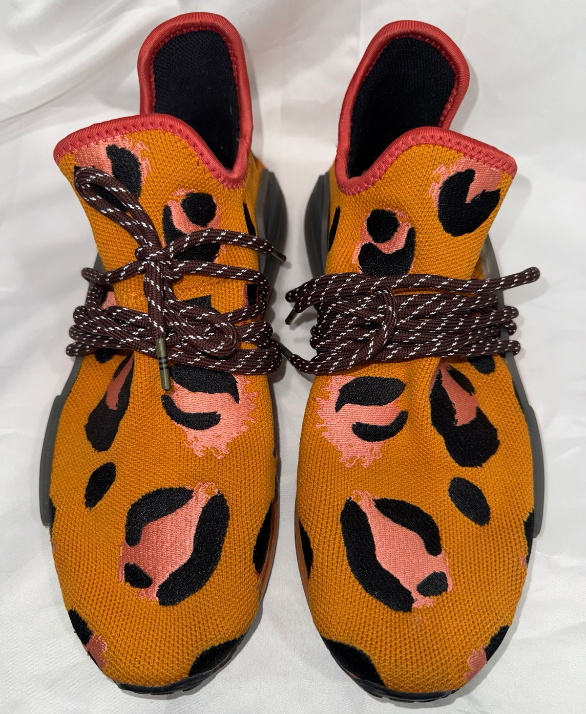 Pharrell adidas NMD Hu Animal Print Pulse Amber front view