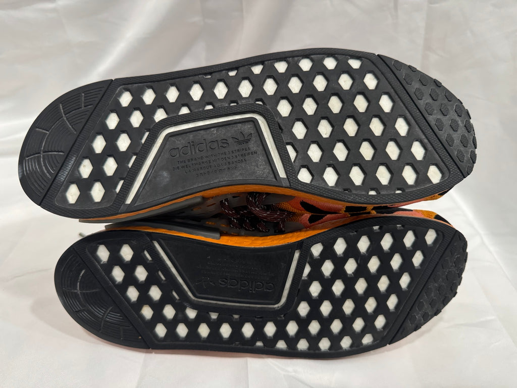 Pharrell adidas NMD Hu Animal Print Pulse Amber outsole view