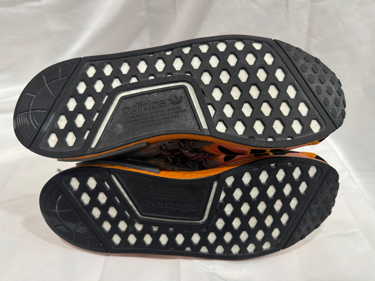 Pharrell adidas NMD Hu Animal Print Pulse Amber outsole view