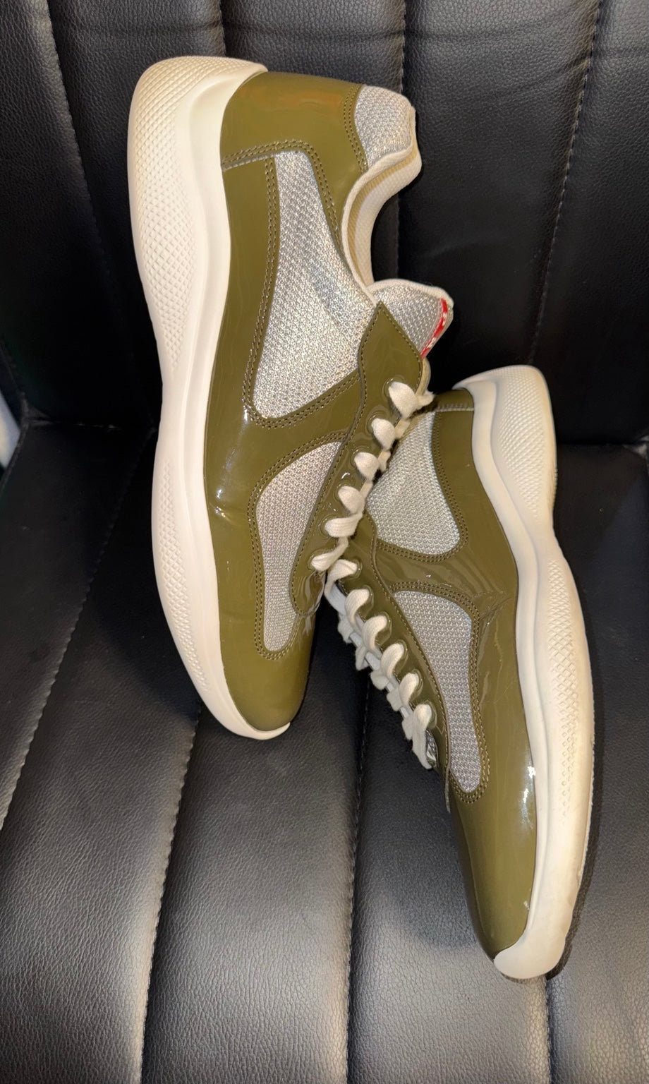 Prada America's Cup green and silver sneakers angled view