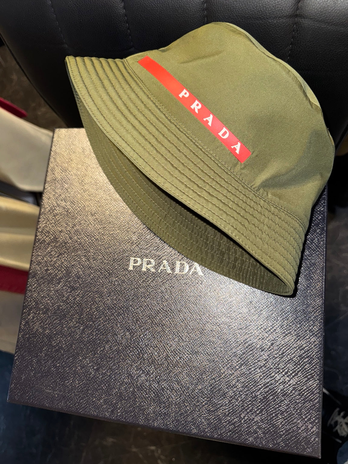 Prada Linea Rossa green bucket hat with original box